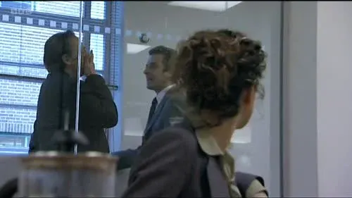 Screenshot: Angela... PRICK! ..can I get you
a fresh cup of, er, coffee or...?