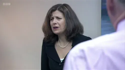 Screenshot: Why would I stand in front of a
walkie-talkie sign? Malcie, Malcie.