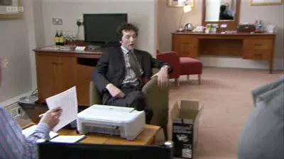 Screenshot: He's got that fringe to hide the lobotomy scars. Is that right?