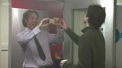 Screenshot: A new desktop picture here. Put the fucking phone down.