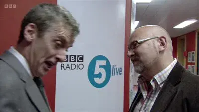 Screenshot: He's got fucking hands the size of fucking doors! Oh, you want to talk about hard men, Malcolm.