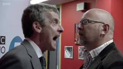 Screenshot: at one of his fucking parties, dressed up in fucking bra, suspenders and fucking black face!