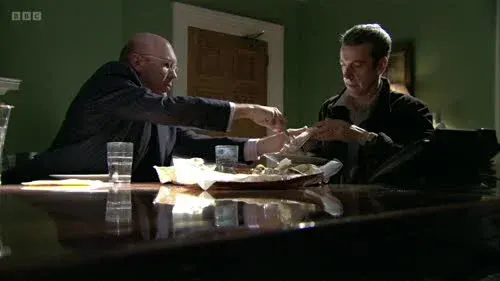 Screenshot: That fine, that's fine. D'you know
what hat it is that I'm wearing?