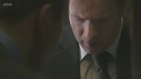 Screenshot: What he's done is close to resting his cock on his boss's wife's shoulder.