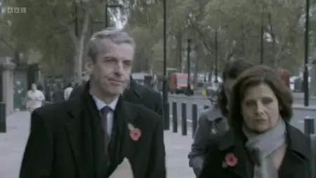 Screenshot: A kitten in a sock. Kitten in a sock, sitting on a motorway, shouting,