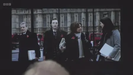 Screenshot: ..in that photograph, there we are.