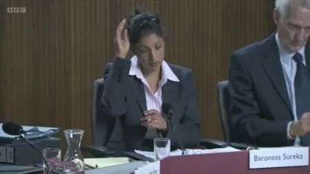 Screenshot: by a man dressed as a pork chop.