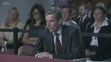 Screenshot: No, no, the photograph shows me holding it.